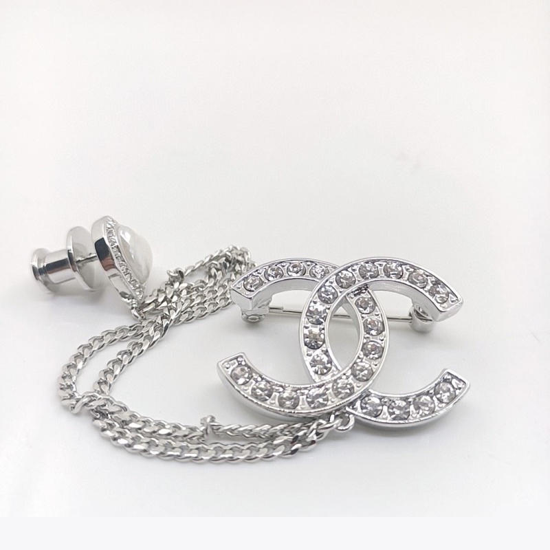 Ch*el brooches